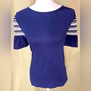 Crown & Ivy blue shirt with detailed sleeves.